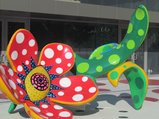 Close-up of vibrant pipe cleaners twisted into a blooming flower sculpture