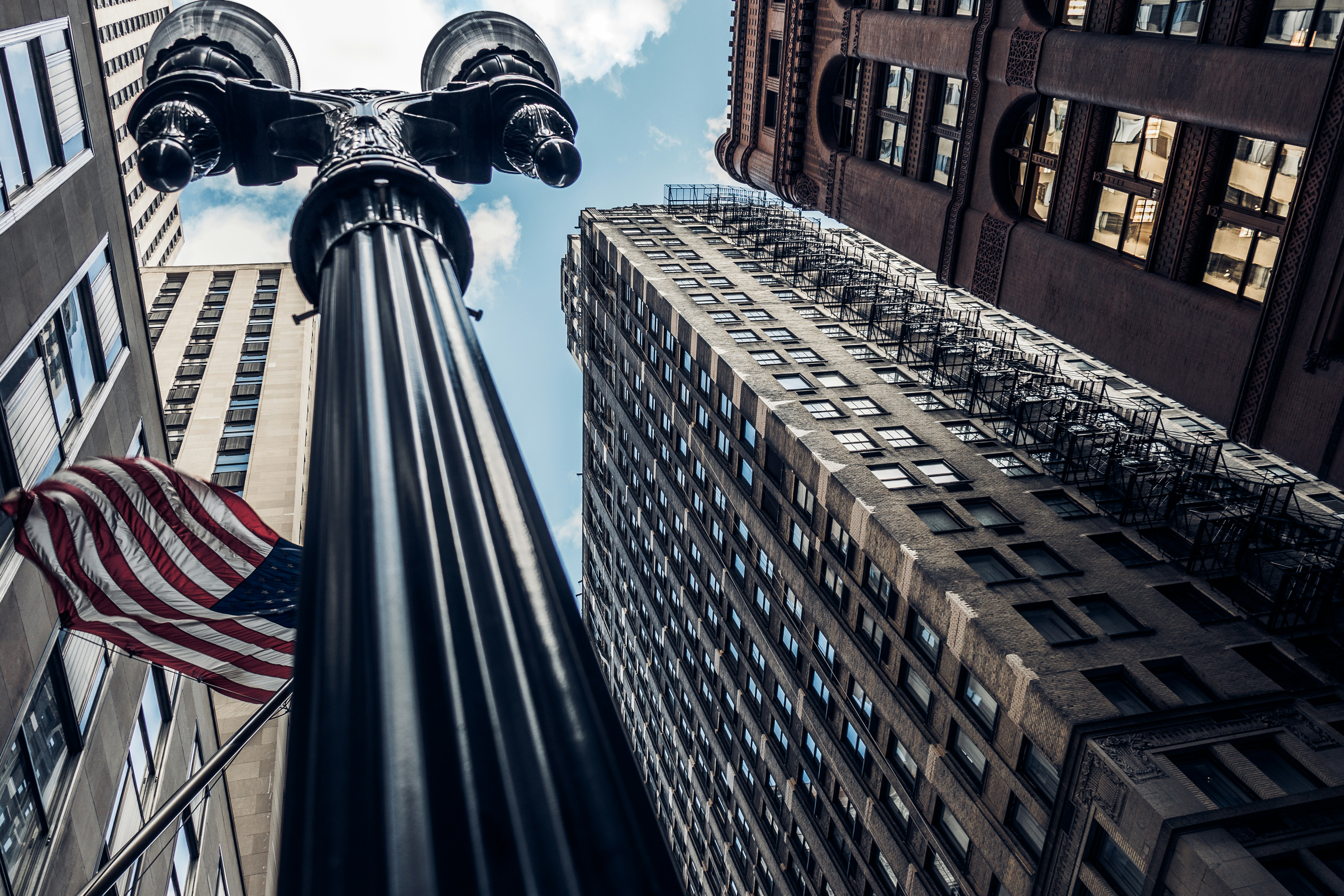 Flag, tall buildings, fire escapes, and cold skys. A typical Chicago winter’s day.
