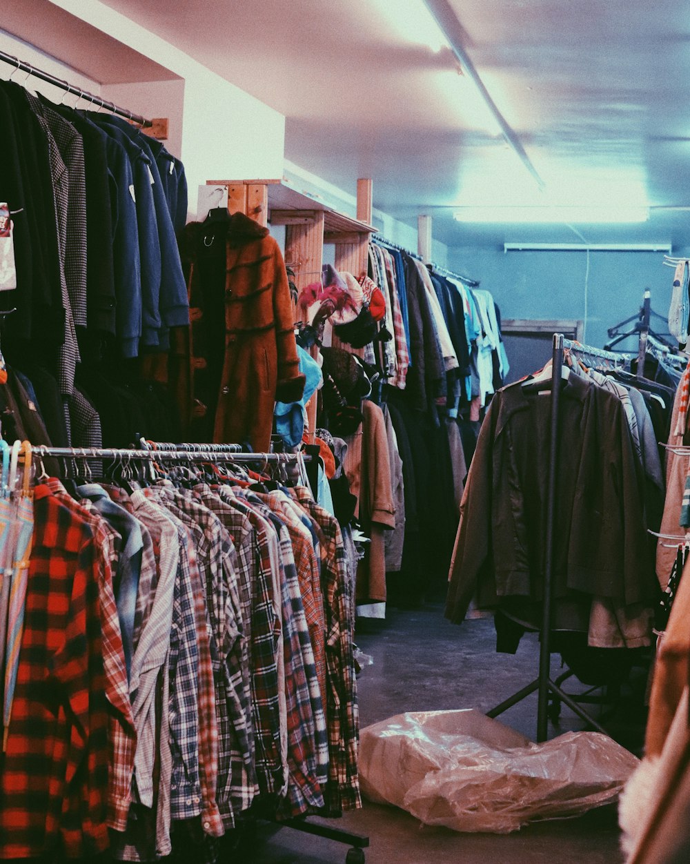 assorted clothes on clothes stand