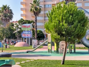 Children playing happily in a safe, green playground within Condominio Tucanes.