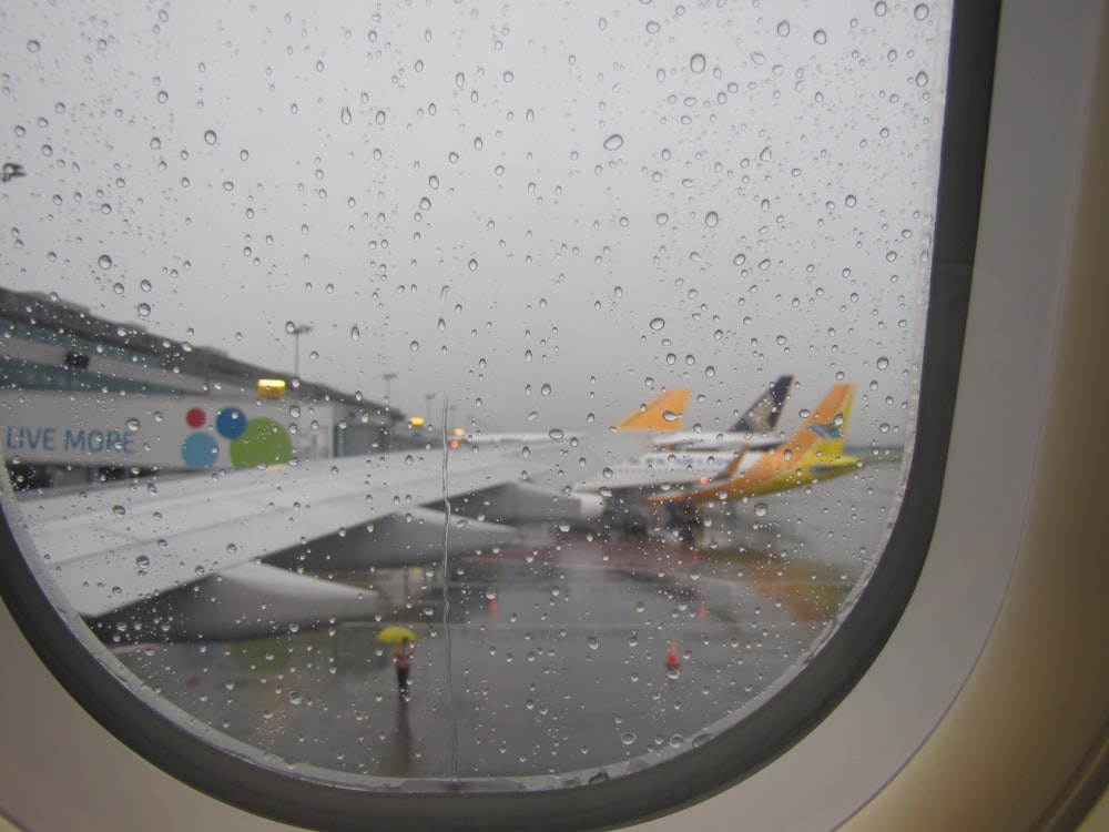 airliner in airport during rainy season