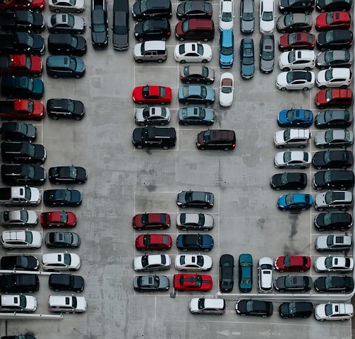 aerial photography of cars on parking lot