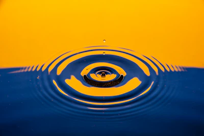 Close-up of a glowing ripple animation spreading from a button click.