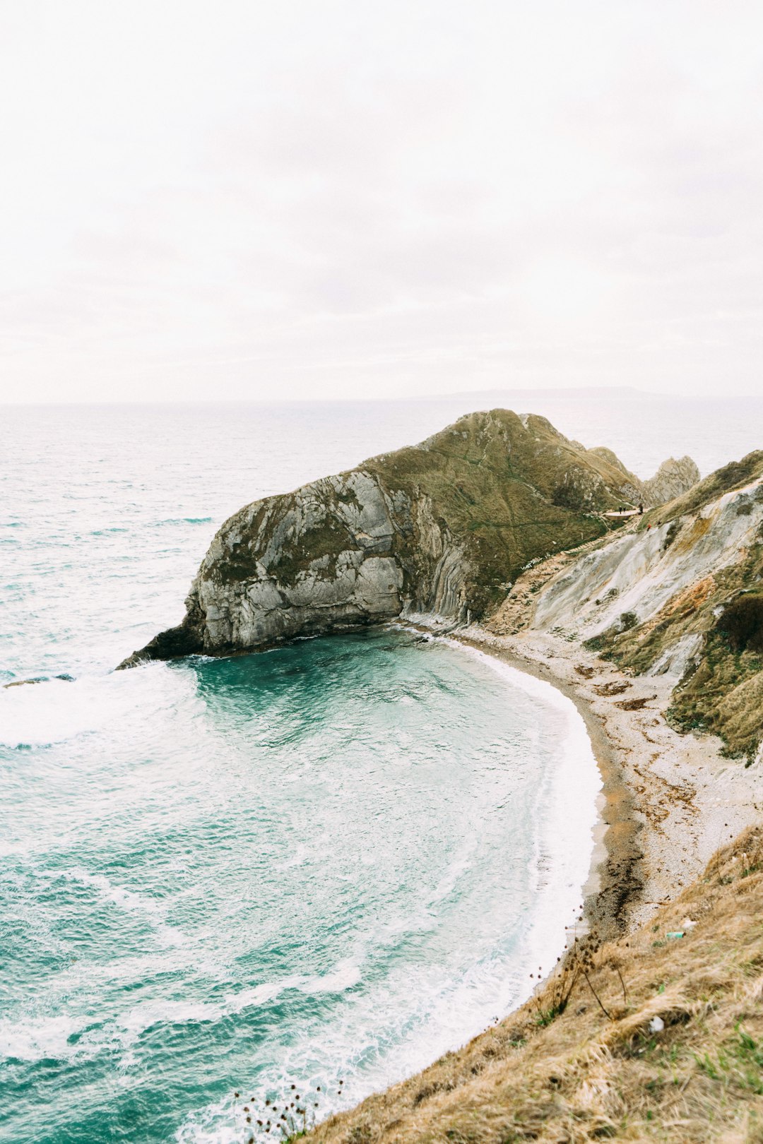 gray and green rock formation during daytime