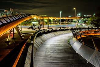 Outdoor pathway lit by elegant modern light fixtures at dusk