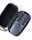 A compact drone with folded arms is neatly placed inside an open black carrying case with a zipper. The drone is sleek and modern, featuring a dark gray color with minor detailing on its surface.