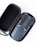 A compact drone with folded arms is neatly placed inside an open black carrying case with a zipper. The drone is sleek and modern, featuring a dark gray color with minor detailing on its surface.