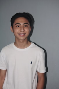 A young patient wearing braces, smiling confidently during an orthodontic check-up.