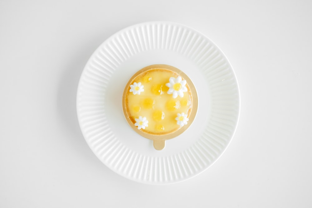 flat-lay photography of custard cake on white plate