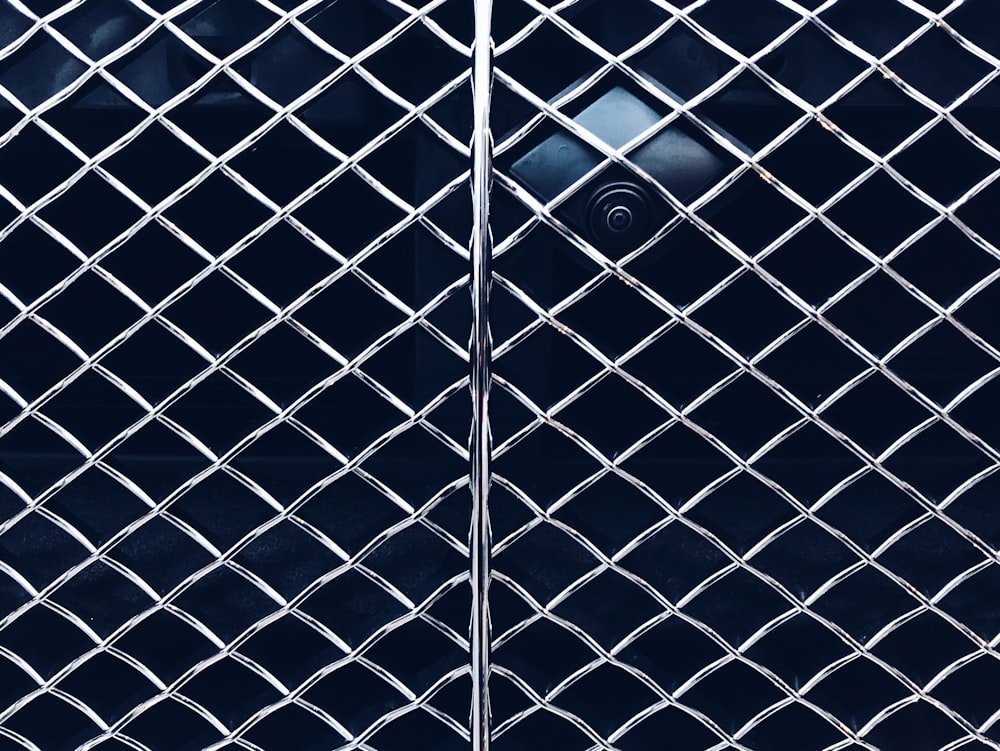 a close up view of a metal fence