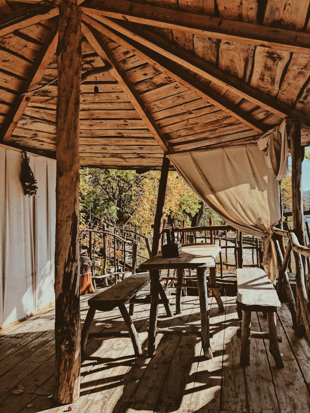 empty dining table inside open cottage