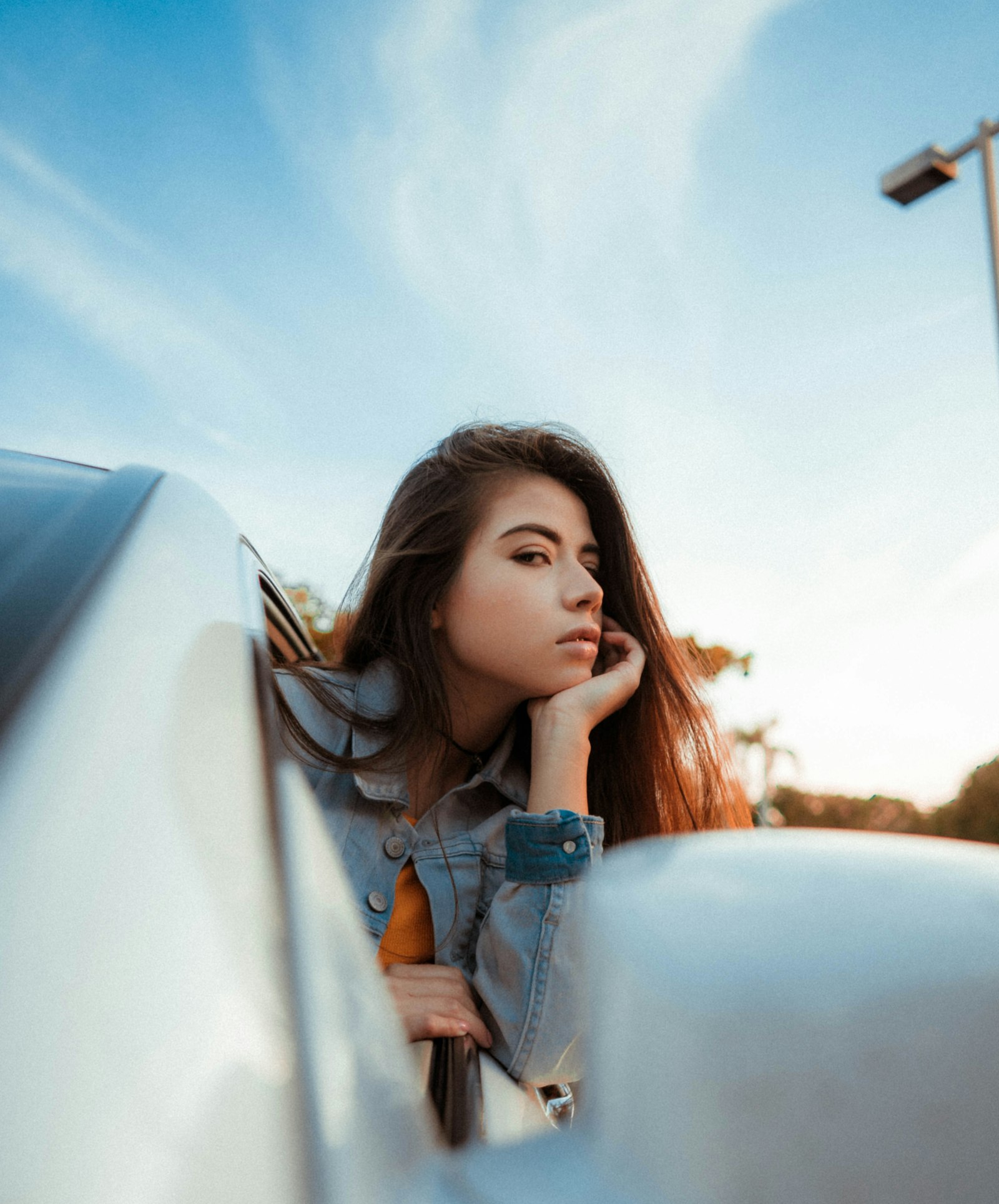 Sony a7 II + ZEISS Batis 25mm F2 sample photo. Woman inside car putting photography