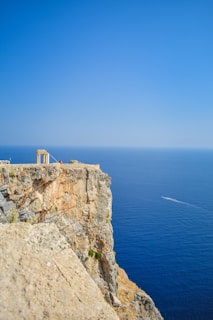 aerial photography of cliff beside ocean
