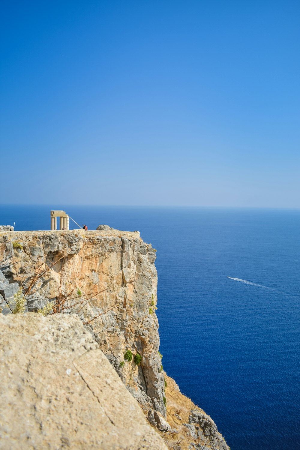 aerial photography of cliff beside ocean