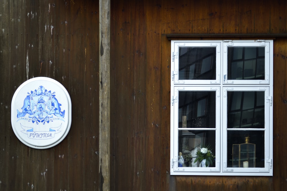 white wooden framed glass window