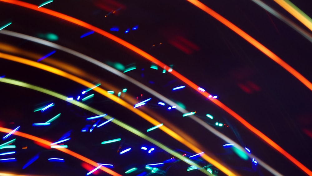 a blurry photo of colorful lights in the dark