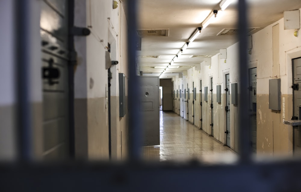 a long hallway with a bunch of lockers in it