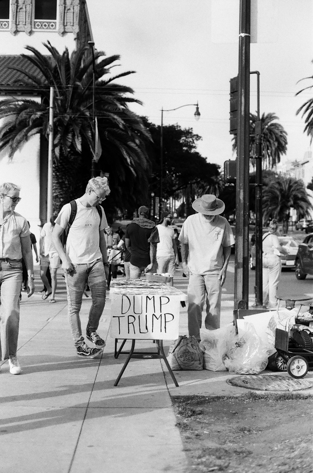 grayscale photography of people on street