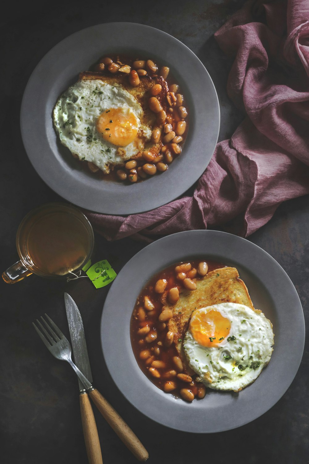 beans and fried egg on plate