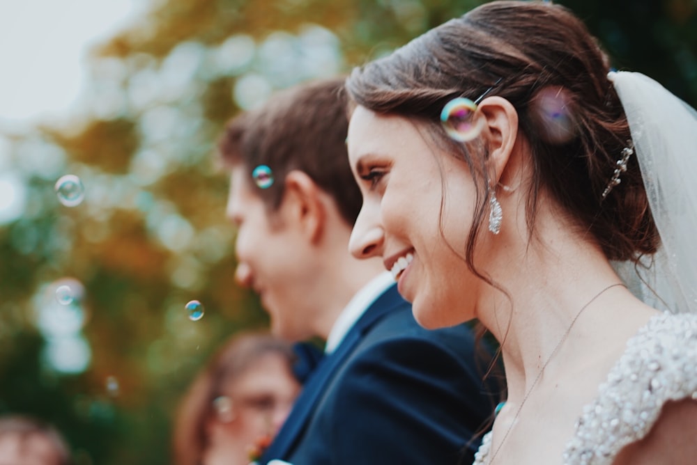 bride and groom smiling