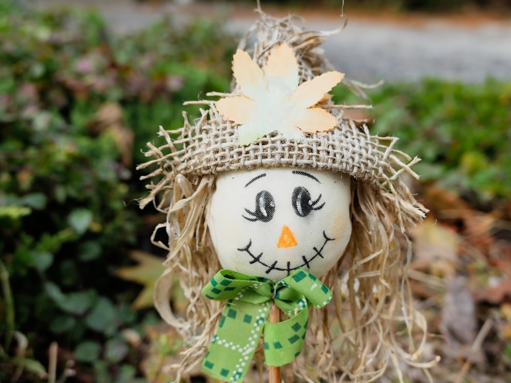 beige and green rag doll