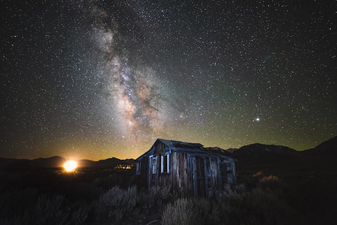 cabin under starry night during nighttime