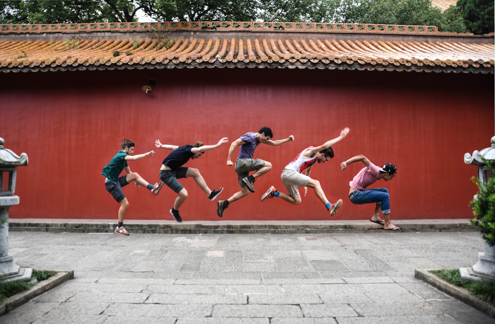 five person jumping