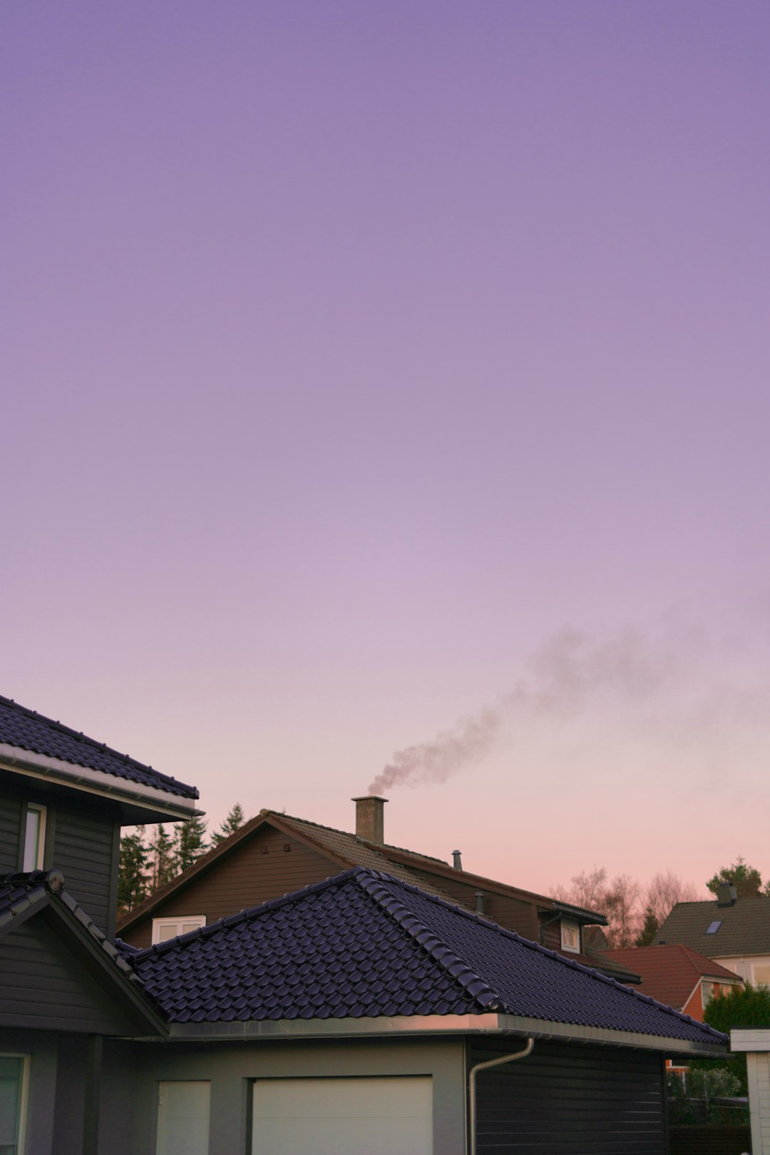  houses with different roof colors chimney