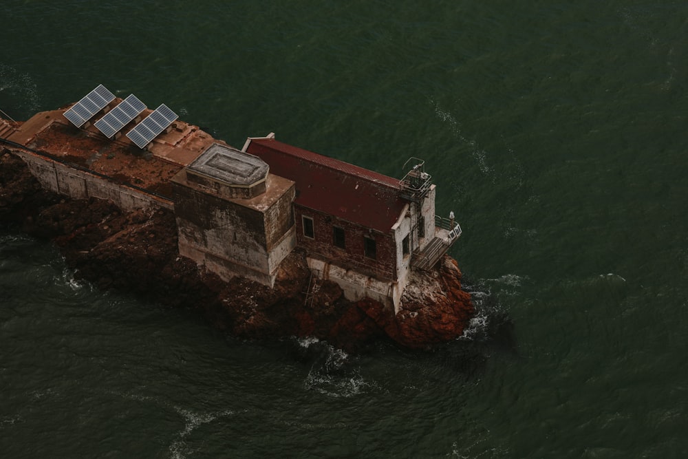 brown building with solar panel on top