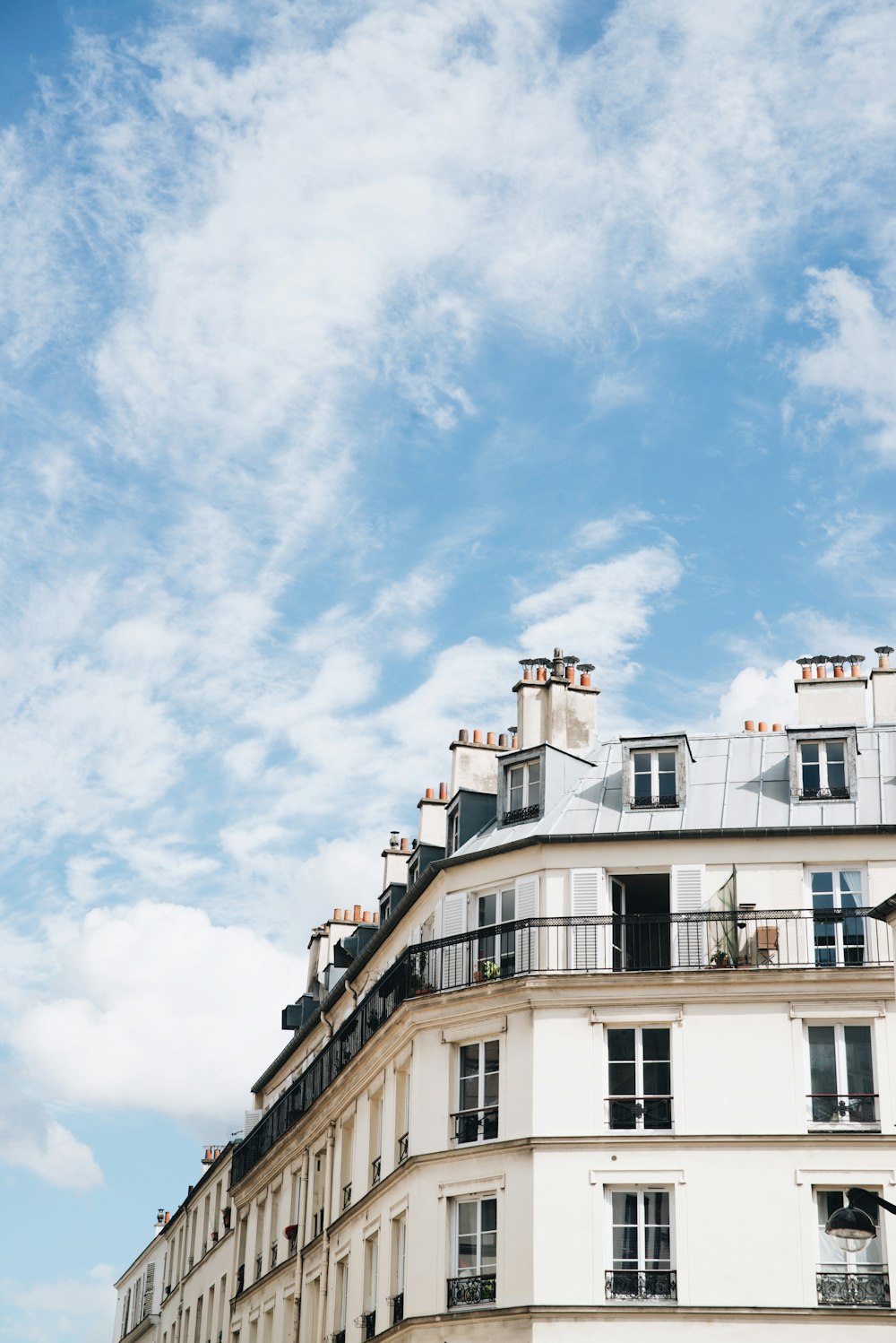 white high rise building under white sky