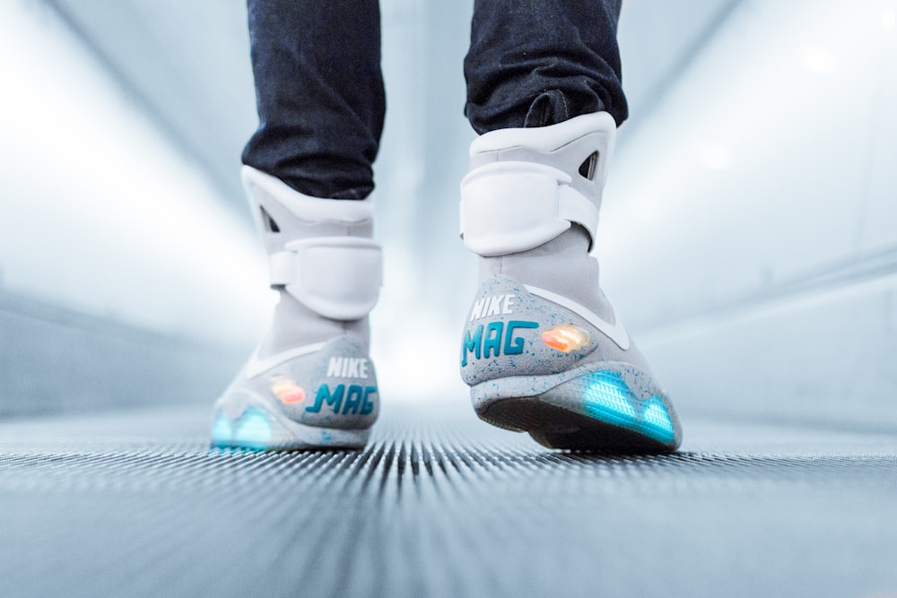 Person wearing grey Nike Mag sneakers photo – Free Style Image on Unsplash