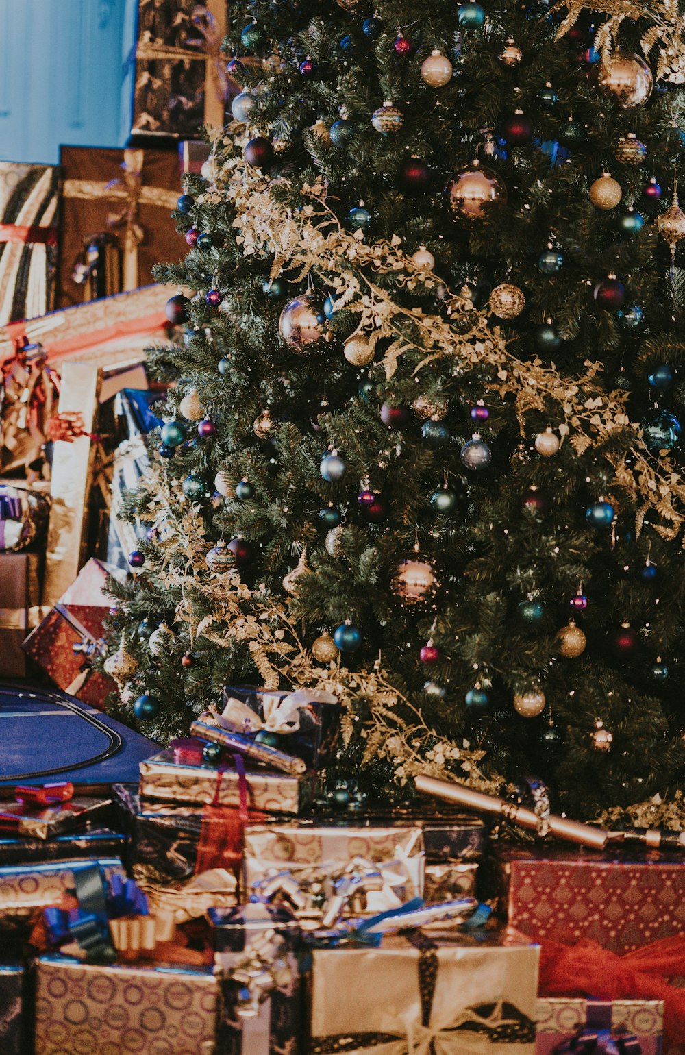 Christmas tree near gift boxes