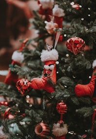 pre-lit Christmas tree with assorted Christmas tree ornaments