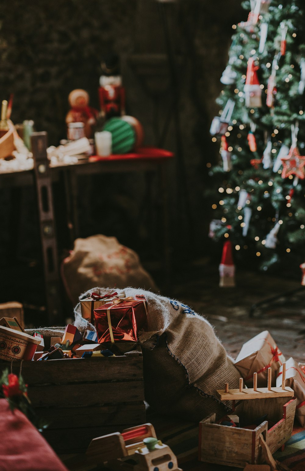 assorted toys near Christmas tree