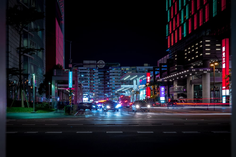 different cars on road near buildings