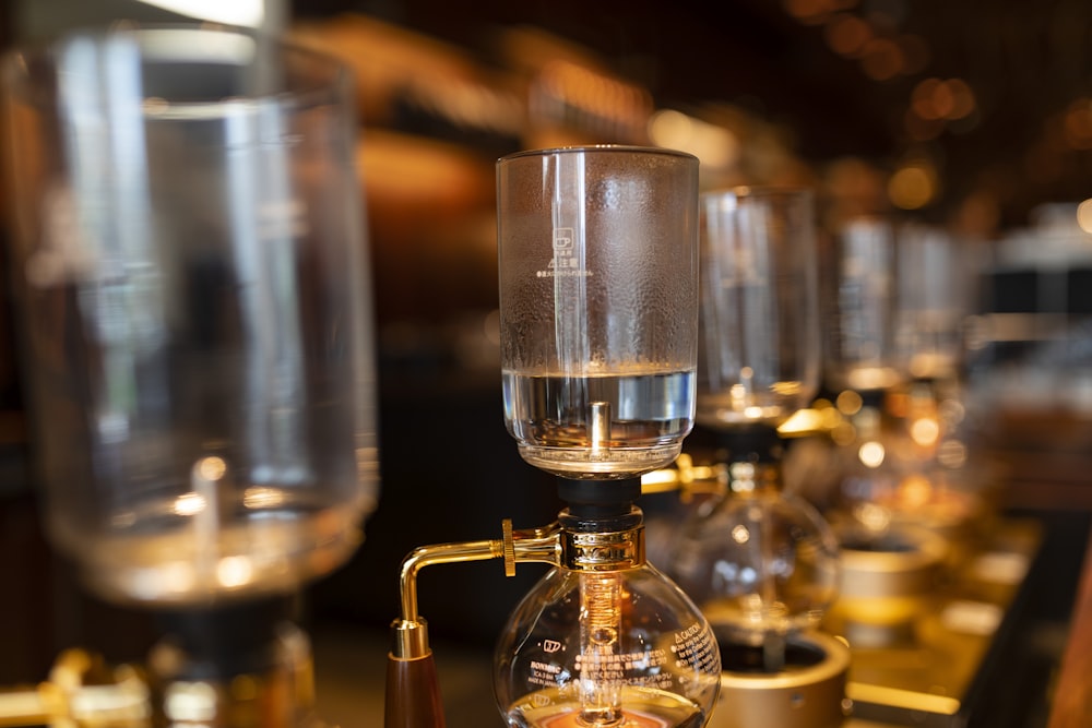 close-up photography of glass dispensers