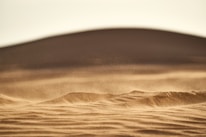 brown sand in closeup photography