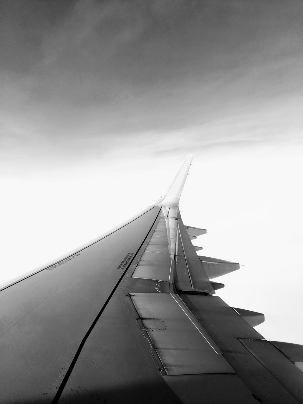 grey jetliner wing with winglet