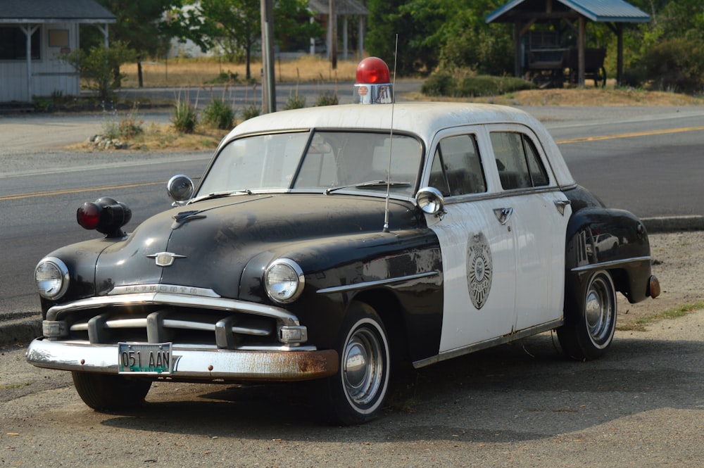 white and black sedan