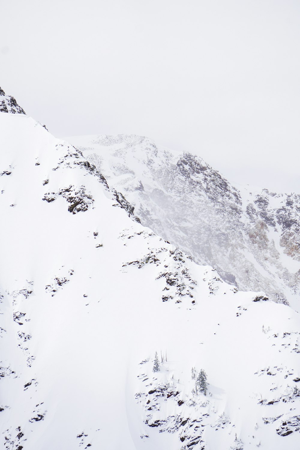 mountain covered with snow during daytime