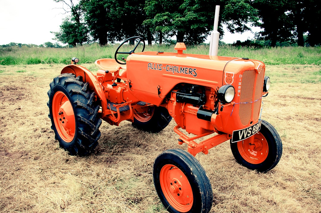 orange tractor on field