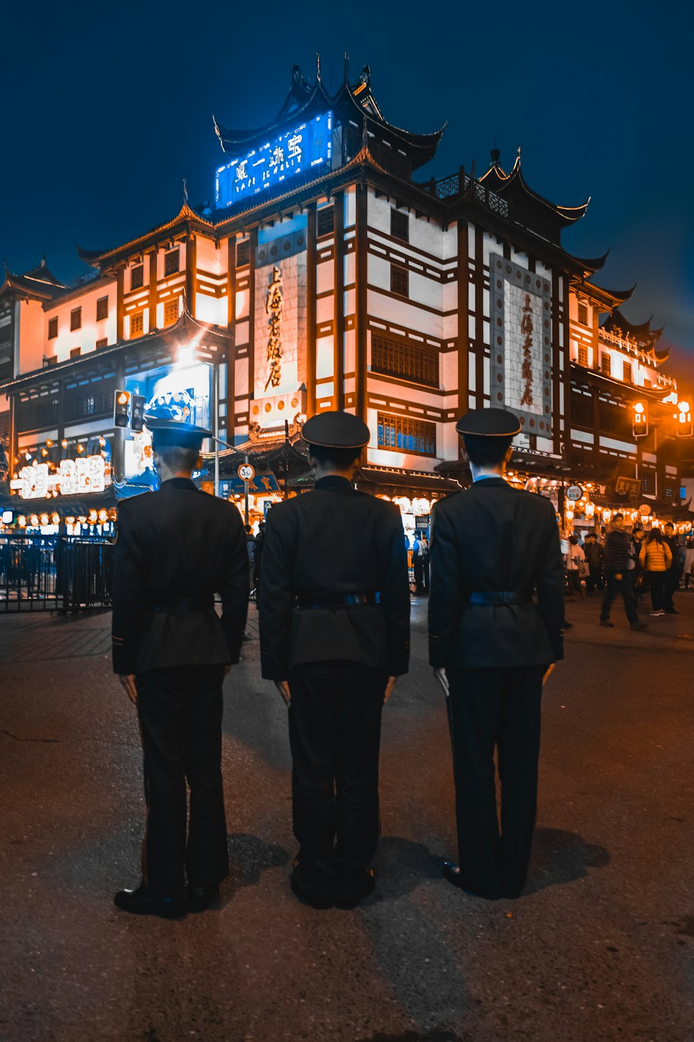 three police officer in city
