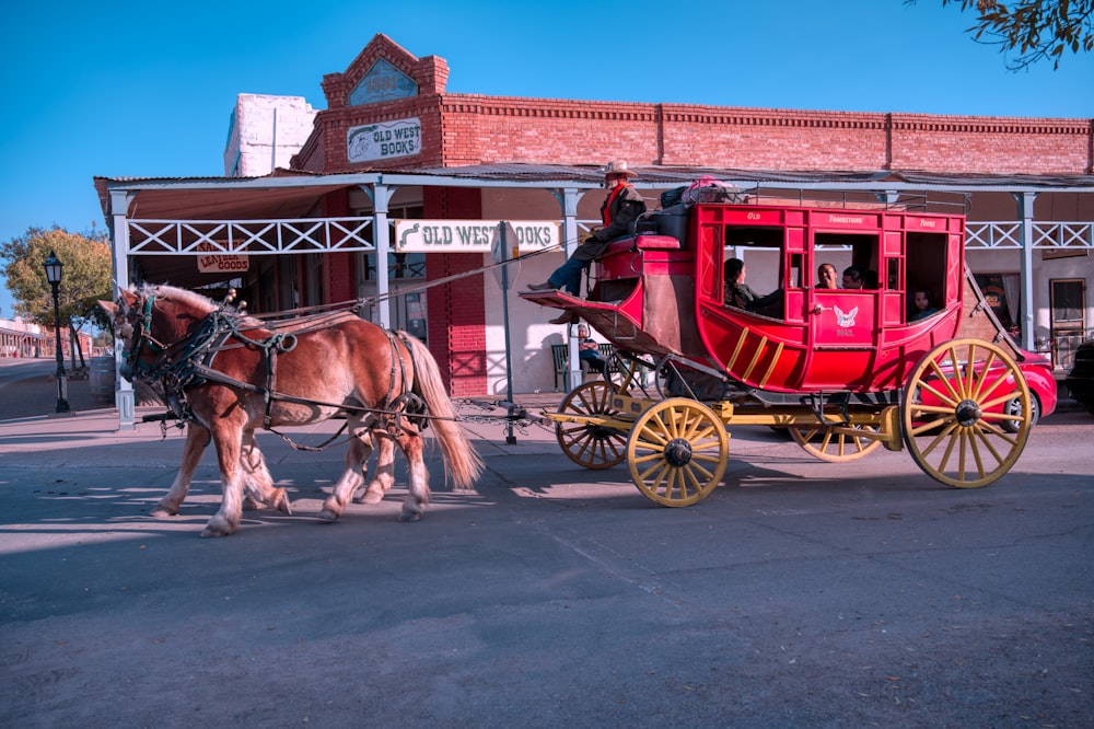 pink carriage with brown horse