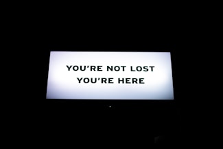 turned-on flat screen TV