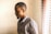 man standing near window