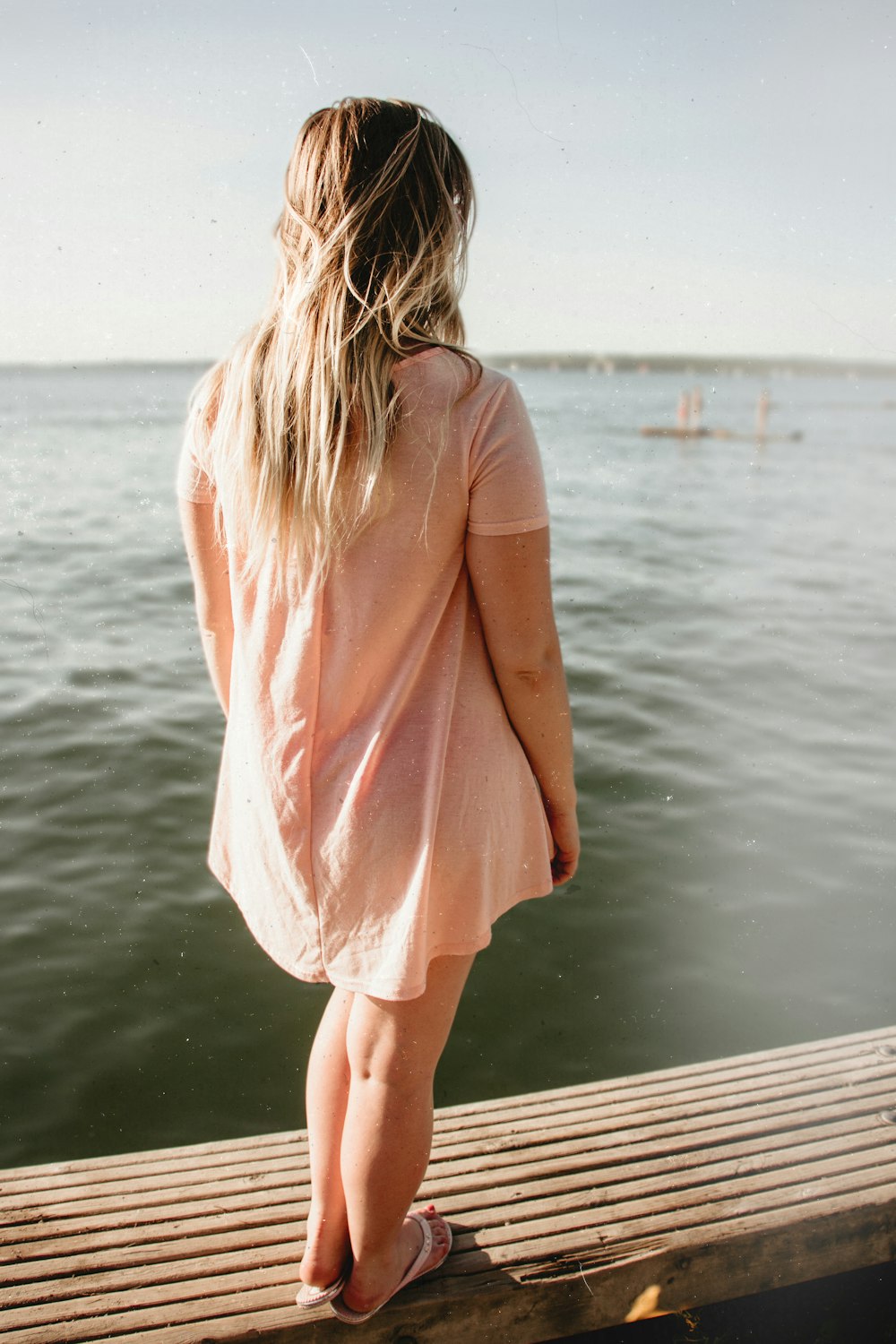 woman standing on dock