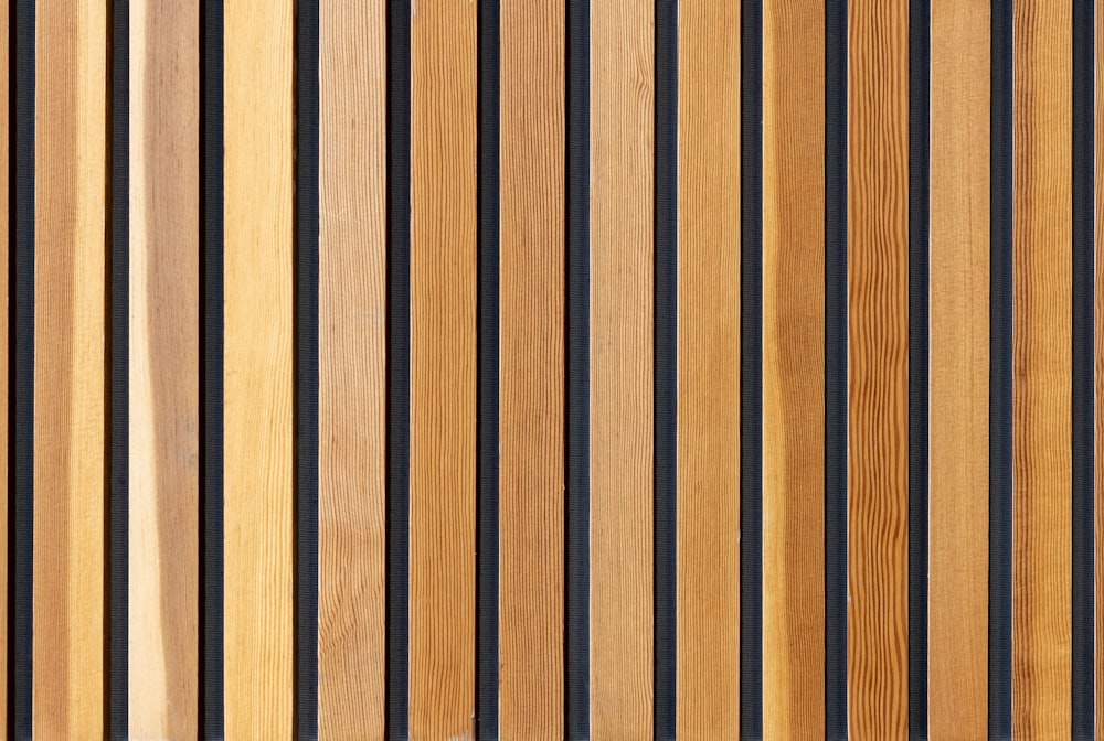 two brown wooden wall decors