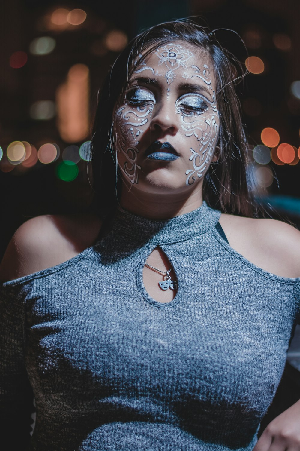 woman with floral face paint