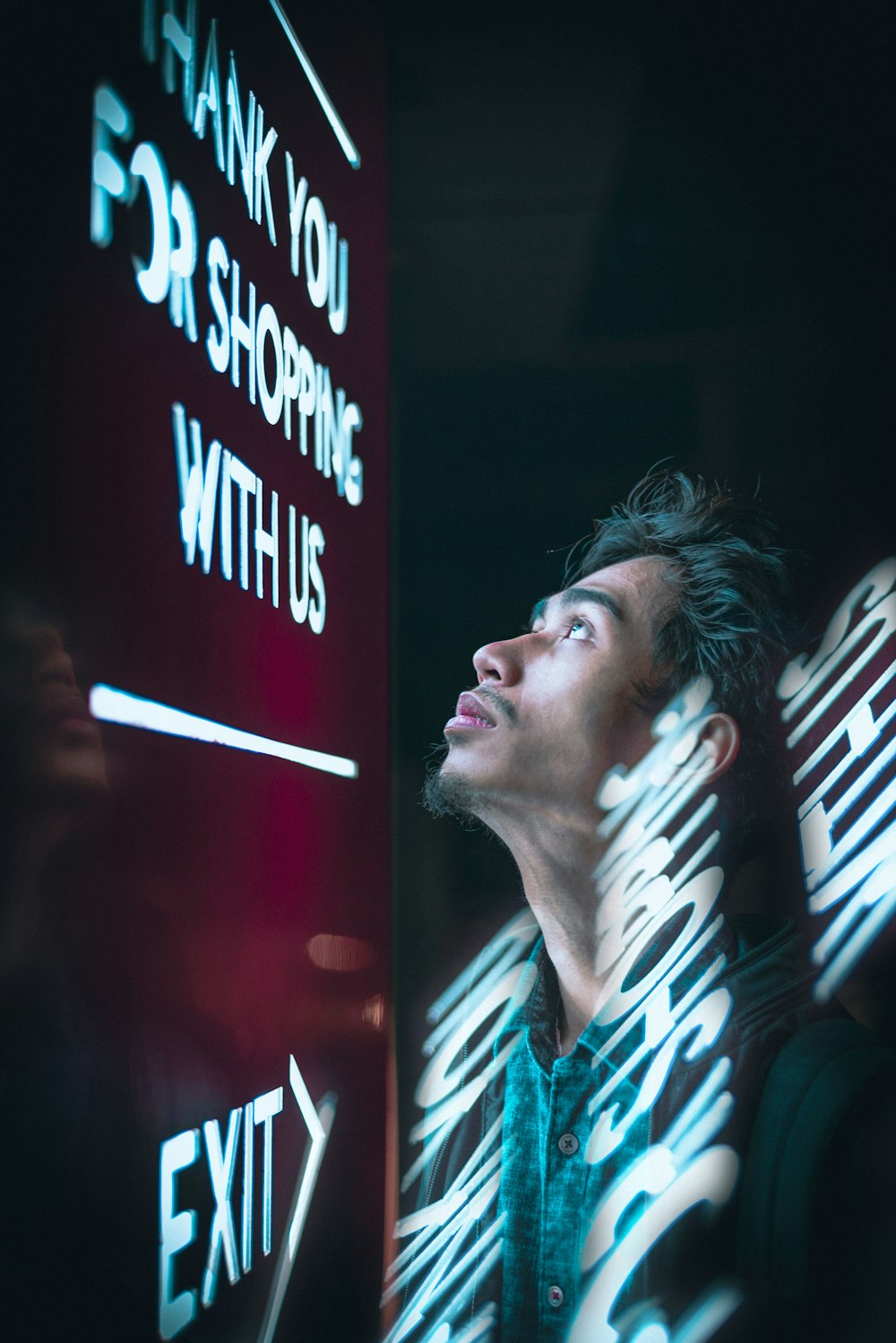 man standing and looking up