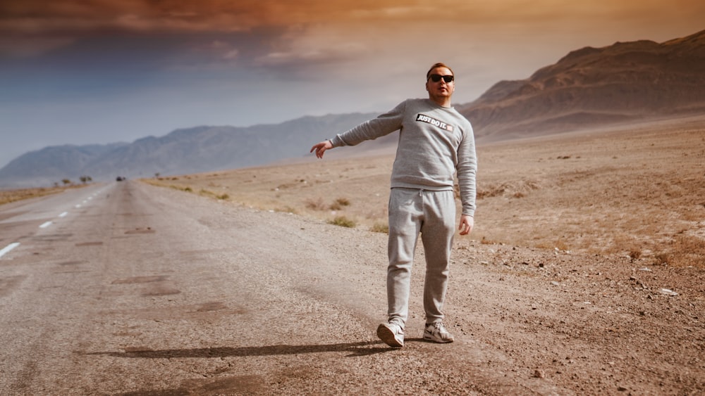 man walking on desert